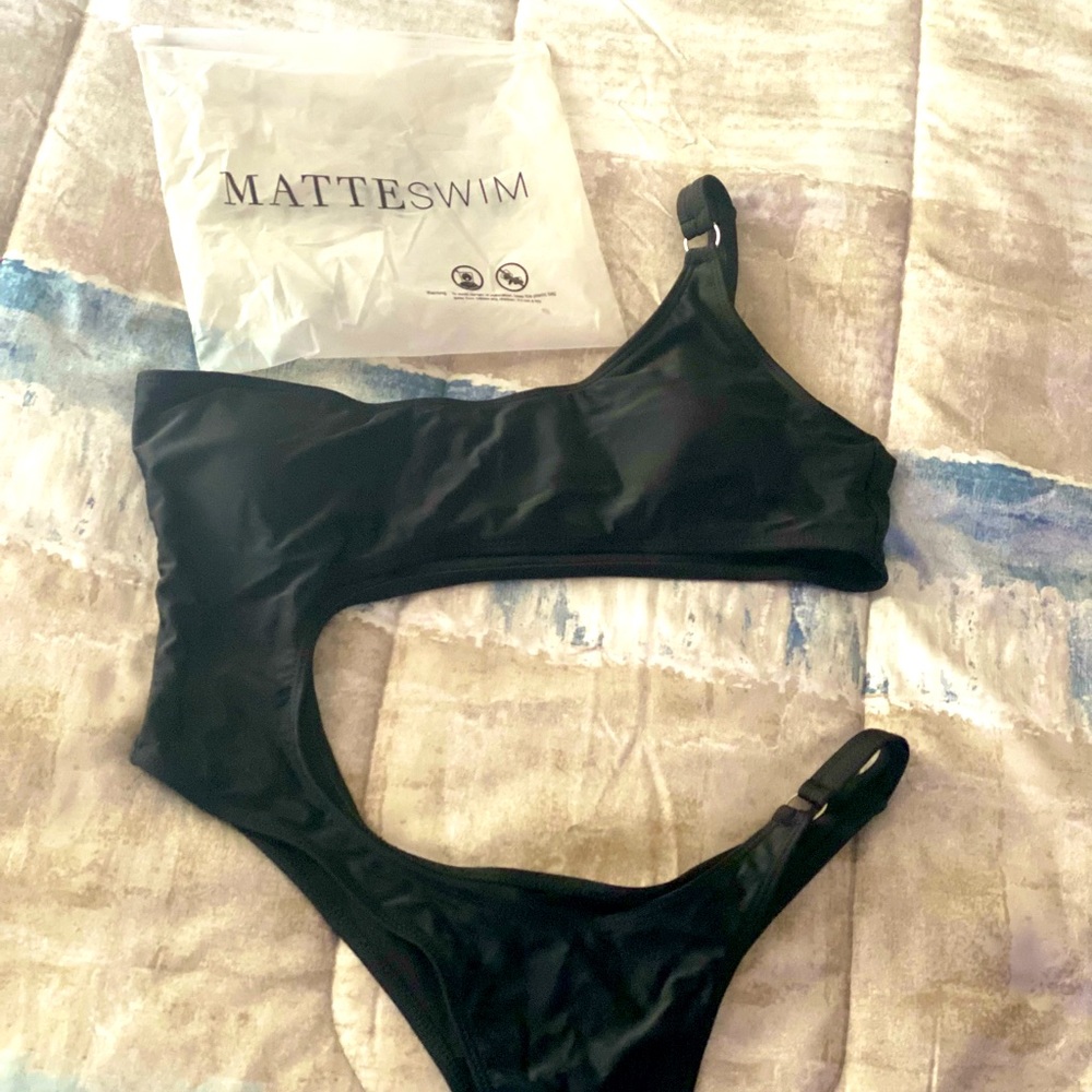 Black one piece cut out swimsuit.